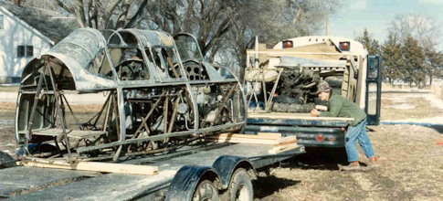 Vultee BT-13A Wreckage being towed to Combat Air Museum for restoration
