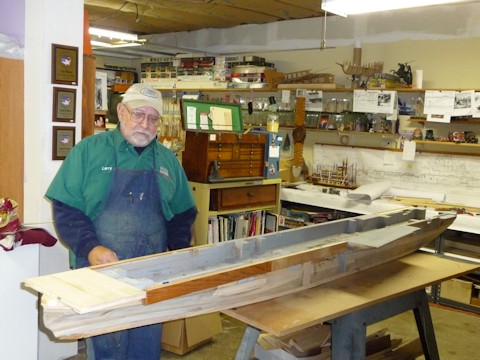 Master modeler Larry Todd contemplates the rebuilding of the hull Oct 2008
