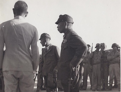 Lt. General Kawabe waits for his luggage to be loaded on board the C-54