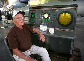 Bob Shideler at the Radar control console